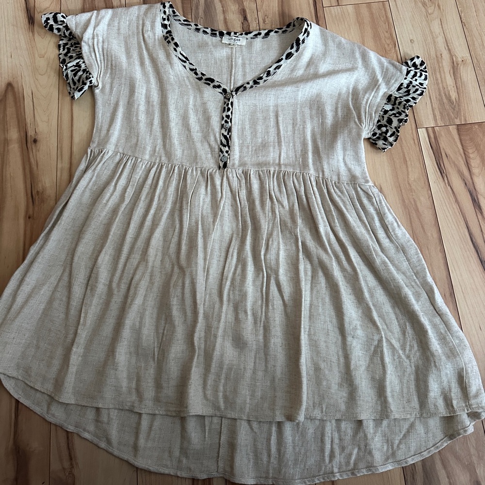 EUC baby doll top with cute polka dot accents.